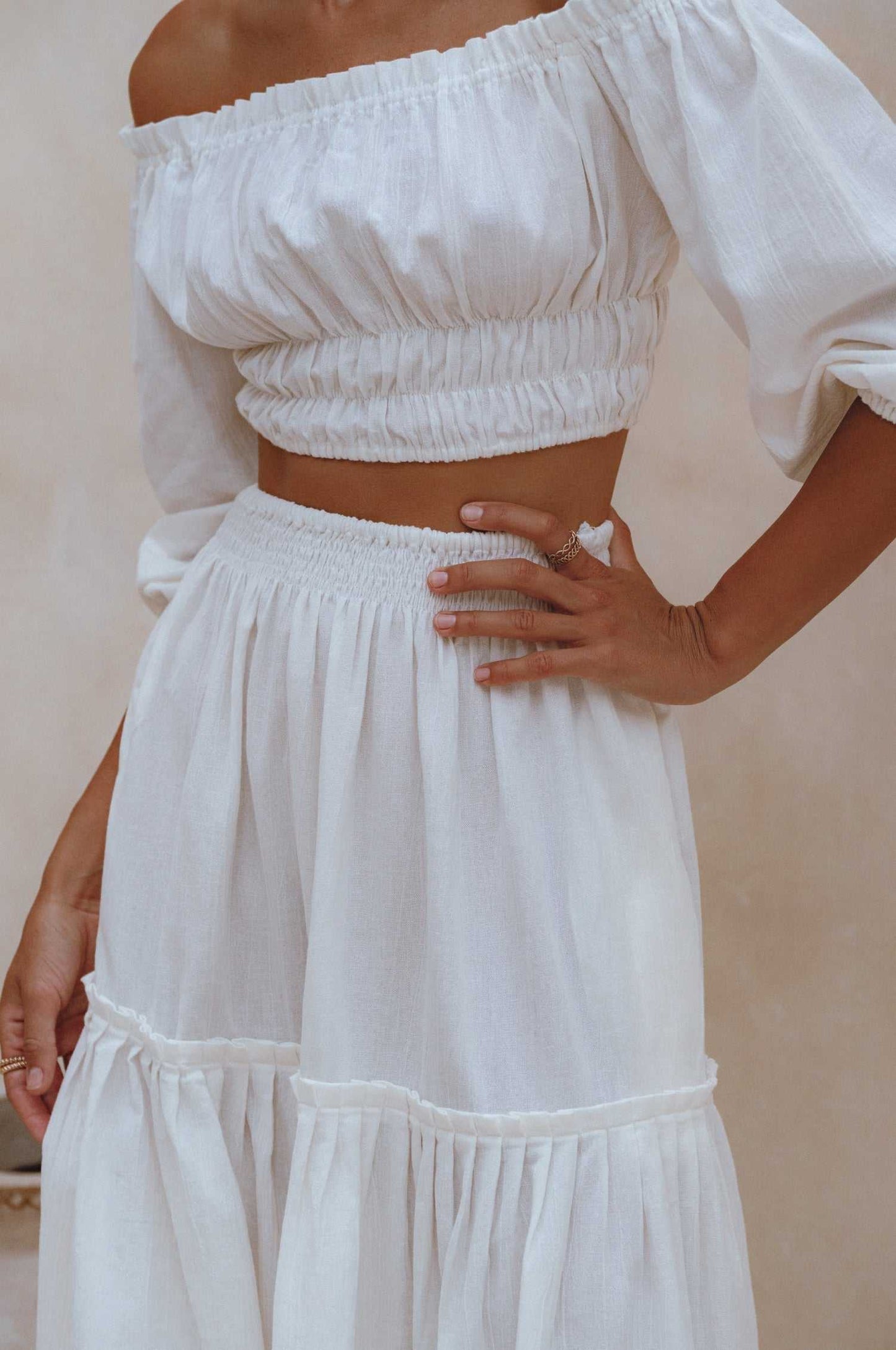 Annabelle linen cropped top with elasticated waist and sleeves.
