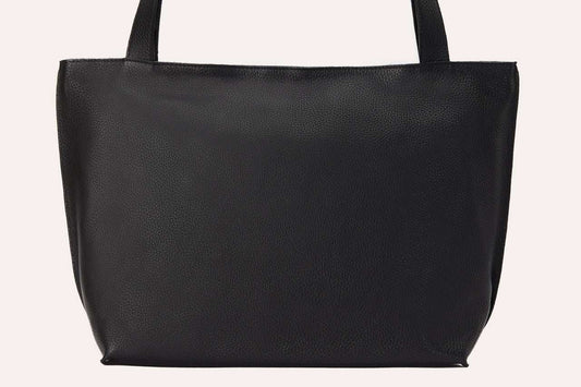 Genuine leather On The Go Tote with top zip closure and interior pockets.