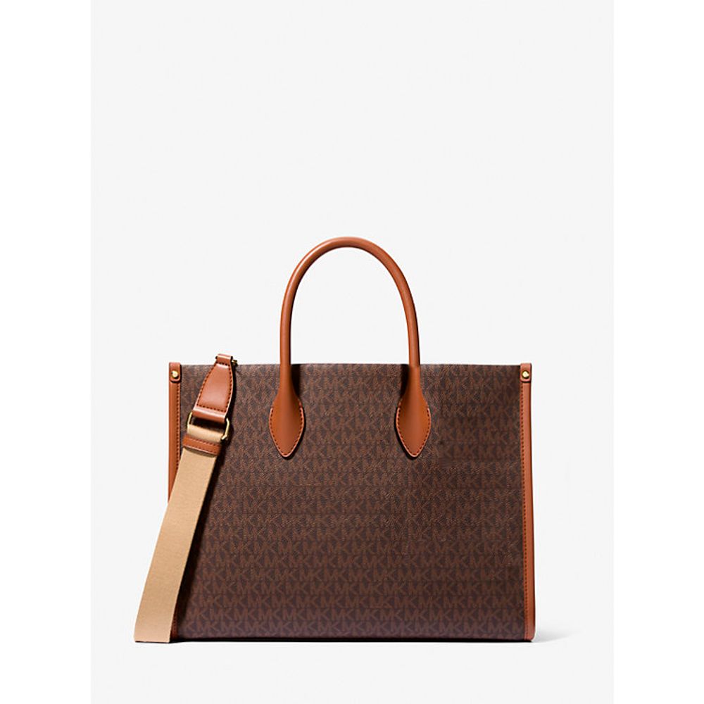 Brown tote bag with tan handles and strap on a white background